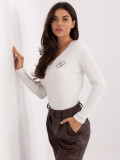 White blouse with embroidery and V-neckline