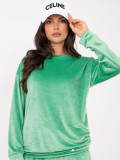 Women's green set with long sleeves and decorative details