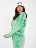 Women's green set with long sleeves and decorative details