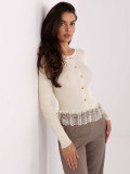 Elegant beige sweater with lace and buttons