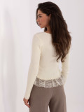 Elegant beige sweater with lace and buttons