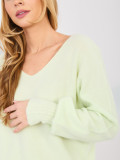 Light green V-neck sweater with balloon sleeves