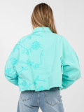 Turquoise women's denim jacket with floral appliqué