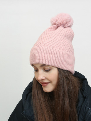 Winter knitted cap in pink colour