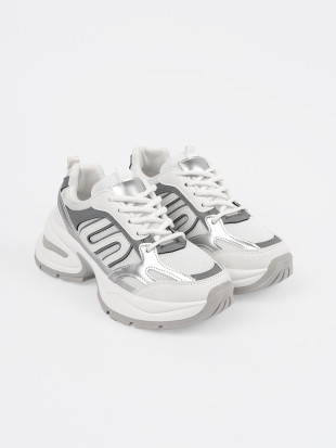 White Sneakers with Silver Accents