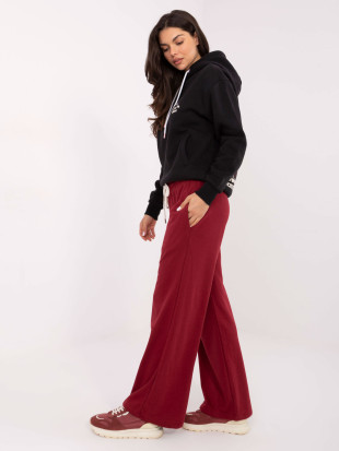Burgundy sweatpants with wide legs